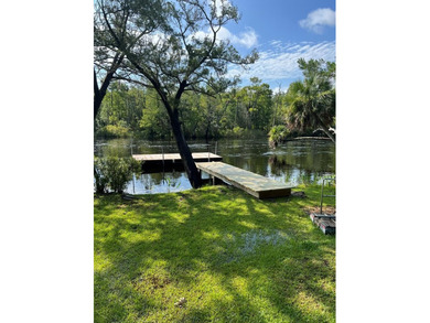 Rare opportunity to own over an acre of deep-water access on the - photo 1
