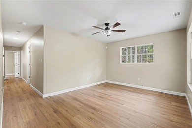 Completely renovated and move-in ready, this 3-bedroom, 2-bath - photo 4