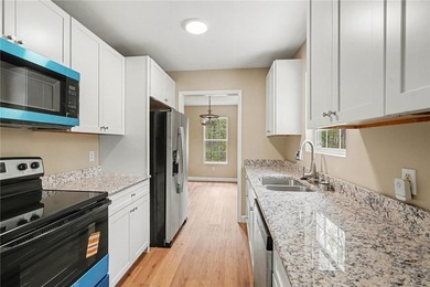 Completely renovated and move-in ready, this 3-bedroom, 2-bath - photo 10