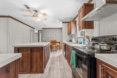 Looking for privacy, acreage, and room to roam? This like-new - photo 3