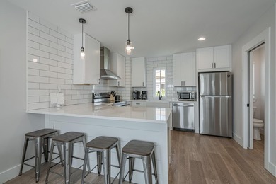 This fully furnished, private, and secluded beach house is a - photo 10
