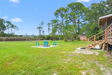 Lowest priced waterfront house in Orange Beach! This charming - photo 7