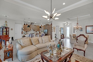 This stunning corner-lot home offers breathtaking lake views and - photo 11