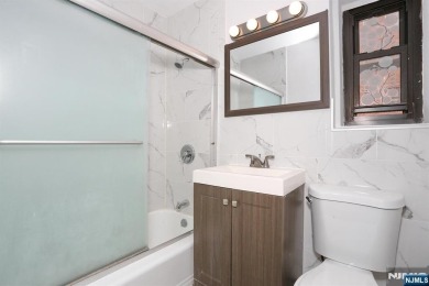 Welcome to 208 Anderson St., a spacious 2-bedroom, 1-bathroom