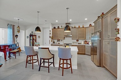 This stunning corner-lot home offers breathtaking lake views and - photo 12