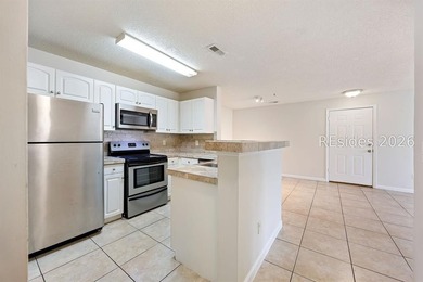 This 3BR/2BA villa at The Estate at Westbury offers a bright - photo 13