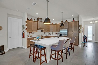 This stunning corner-lot home offers breathtaking lake views and - photo 13