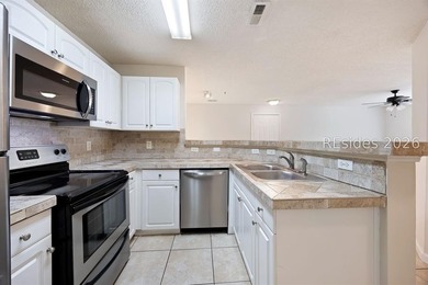 This 3BR/2BA villa at The Estate at Westbury offers a bright - photo 14