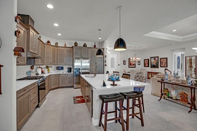 This stunning corner-lot home offers breathtaking lake views and - photo 14