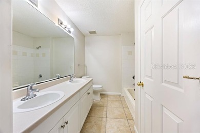 This 3BR/2BA villa at The Estate at Westbury offers a bright - photo 30