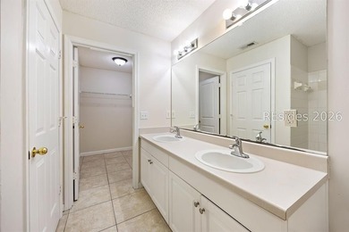 This 3BR/2BA villa at The Estate at Westbury offers a bright - photo 31