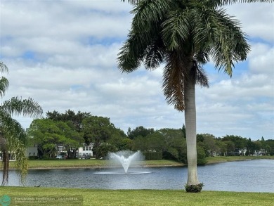 Lake Condo For Sale in Deerfield Beach, Florida