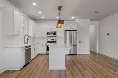 SELLER SAYS - THIS MUST GO! Now priced below comps & ideally - photo 8