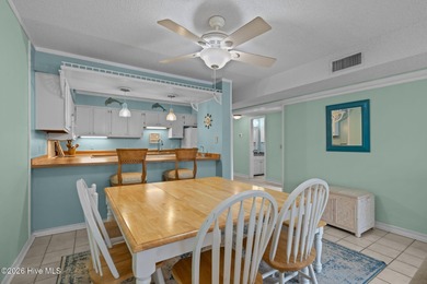 Experience the best of both worlds with this soundside condo