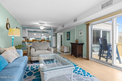 Experience the best of both worlds with this soundside condo