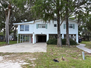 Waterfront paradise with incredible potential! This elevated - photo 2