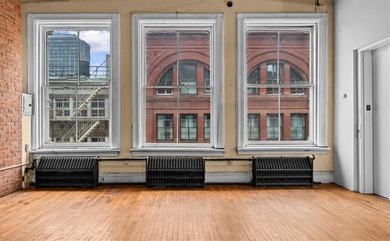 Welcome to your future haven at 100 Prince Street, Penthouse - photo 1