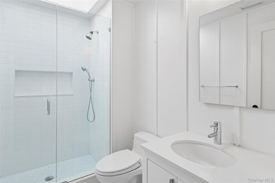 Set on the tranquil shores of Genet Creek, this modern - photo 20