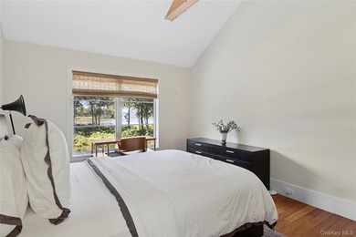 Set on the tranquil shores of Genet Creek, this modern - photo 21