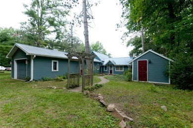 This beautifully updated four-season home offers 50 feet of - photo 1