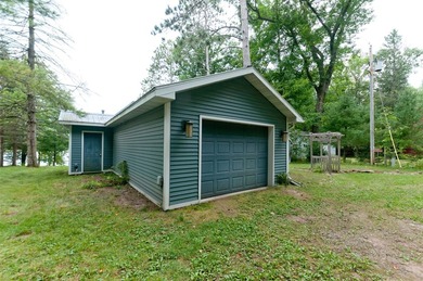 This beautifully updated four-season home offers 50 feet of - photo 2