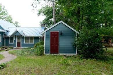 This beautifully updated four-season home offers 50 feet of - photo 3