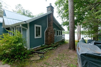 This beautifully updated four-season home offers 50 feet of - photo 5