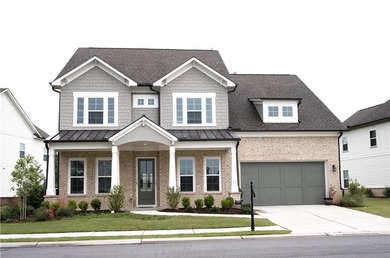 Like-new West-facing Ashton Woods home 4 bedrooms | 4 bathrooms - photo 2