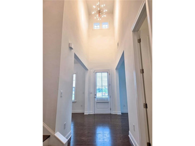 Like-new West-facing Ashton Woods home 4 bedrooms | 4 bathrooms - photo 3