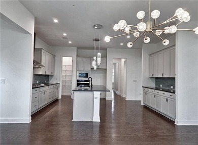 Like-new West-facing Ashton Woods home 4 bedrooms | 4 bathrooms - photo 7