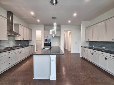 Like-new West-facing Ashton Woods home 4 bedrooms | 4 bathrooms - photo 8