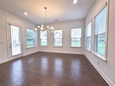 Like-new West-facing Ashton Woods home 4 bedrooms | 4 bathrooms - photo 9