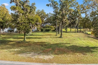 Beautiful homesite with stunning long lake views, nestled on a - photo 14