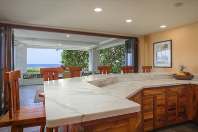 This oceanfront four-bedroom, four-bathroom residence within - photo 12