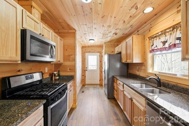 Beautiful cabin oasis tucked away in the gated community of - photo 3