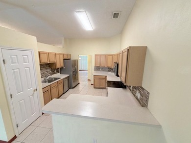 Welcome to this beautifully maintained Port St. Lucie home - photo 13