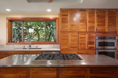 This oceanfront four-bedroom, four-bathroom residence within - photo 14