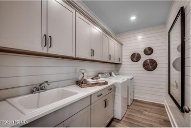 The Fullerton is a two-story Craftsman-style home offering three - photo 18