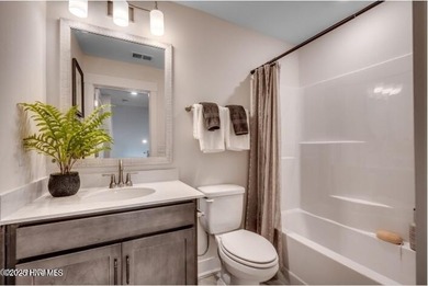 The Fullerton is a two-story Craftsman-style home offering three - photo 20