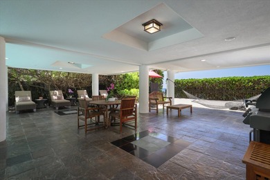 This oceanfront four-bedroom, four-bathroom residence within - photo 21