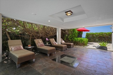 This oceanfront four-bedroom, four-bathroom residence within - photo 22