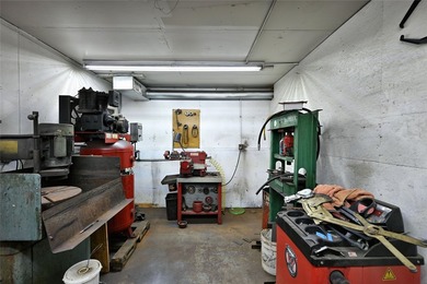 This versatile commercial property has a long-standing history - photo 25