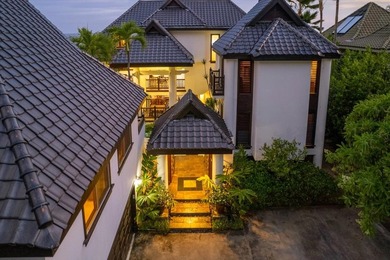 This oceanfront four-bedroom, four-bathroom residence within - photo 27