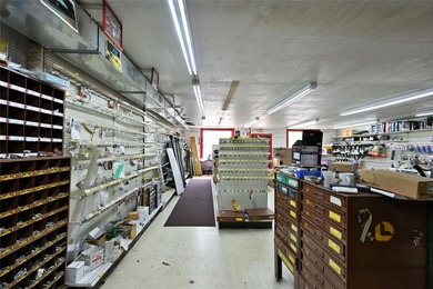 This versatile commercial property has a long-standing history - photo 29