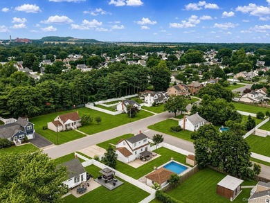Welcome to this beautifully maintained Expanded Cape nestled in - photo 30