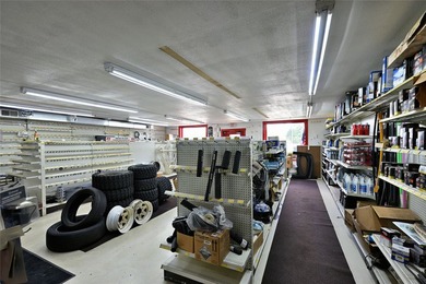 This versatile commercial property has a long-standing history - photo 32