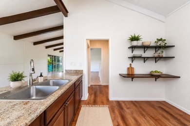 Tucked away in the lush Hawaiian Beaches community, just minutes - photo 25