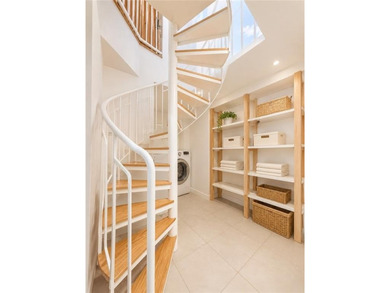 A Cozy & Spacious First-Floor Condo with Basement & Parking in a - photo 12