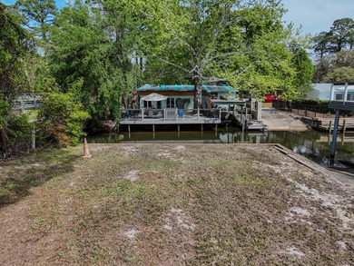 WATERFRONT BUILDABLE LOT! Build your dream home on this canal - photo 12