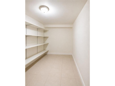 A Cozy & Spacious First-Floor Condo with Basement & Parking in a - photo 13